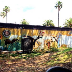 Mural inspired by Chumash petroglyphs, Anisq'Oyo Park, Isla Vista. Photo by author. 